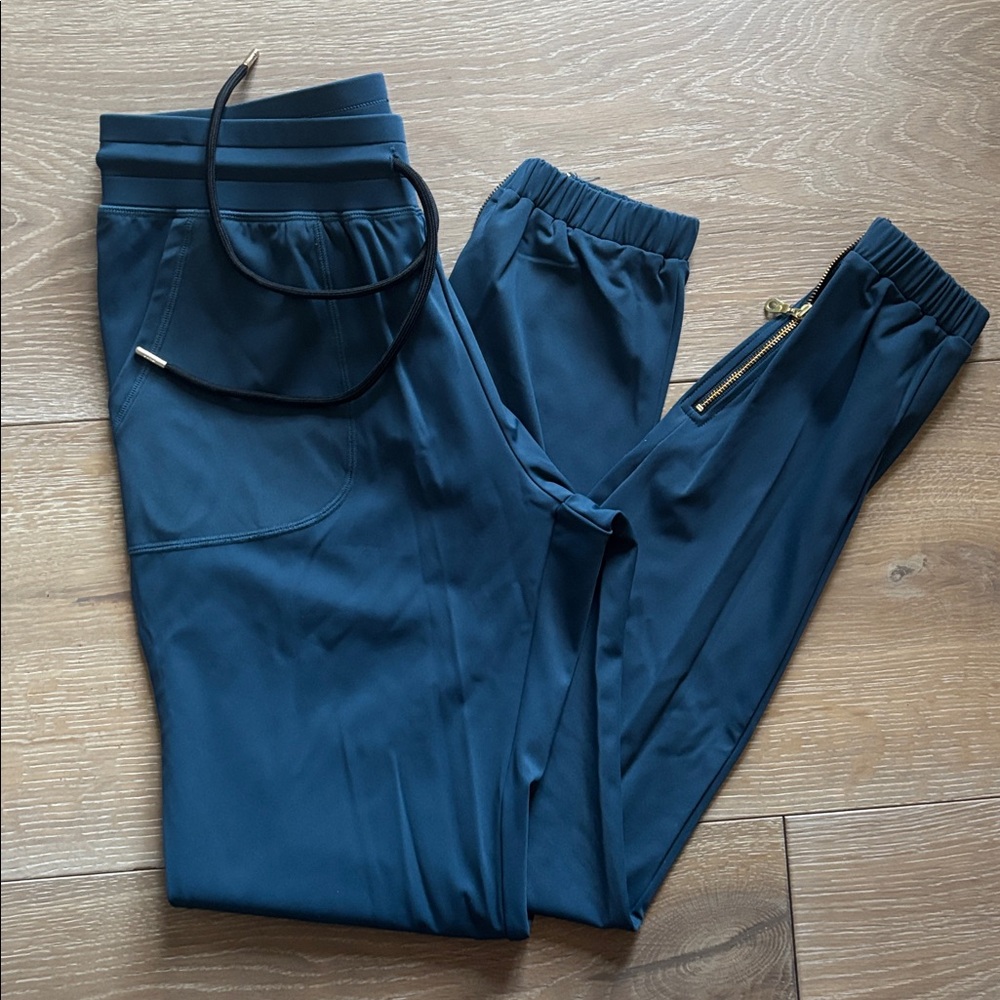 ZYIA Teal Track Joggers with Gold Zip Accent